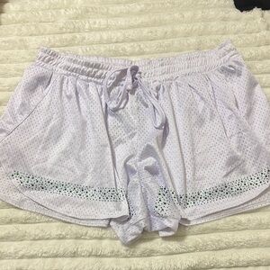 White Mesh Athletic Shorts with Green Accents